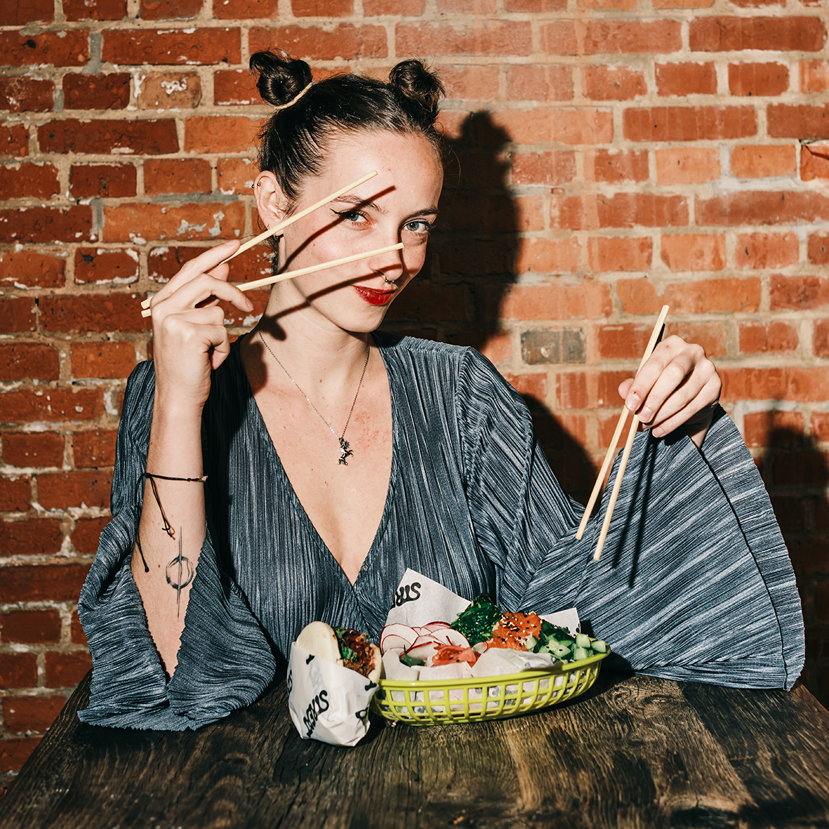 Asian girl eating Street food Streat Brussels